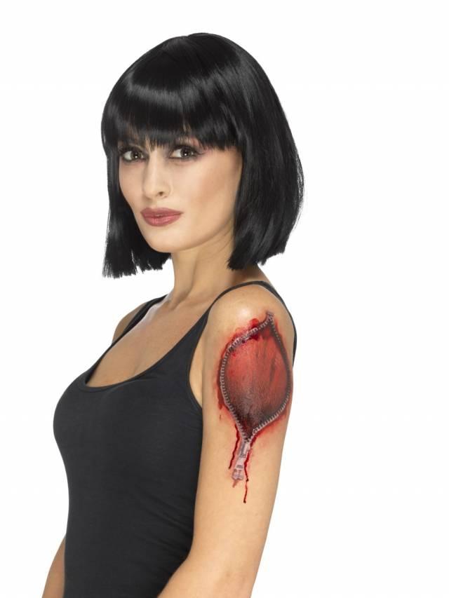 Ripped Skin Tattoo